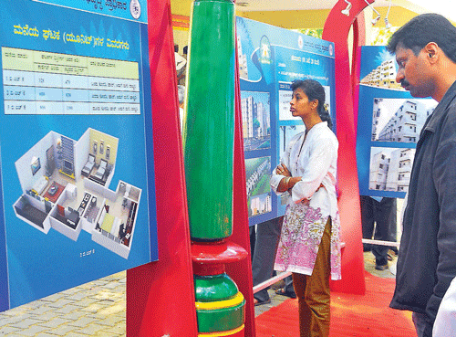 choice by chance: Visitors go through information on BDA properties at the inauguration  of the lottery system in the City on Thursday. dh photo