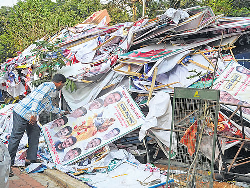 Flexes, posters and buntings dumped near the BBMP office on Friday. Dh Photo