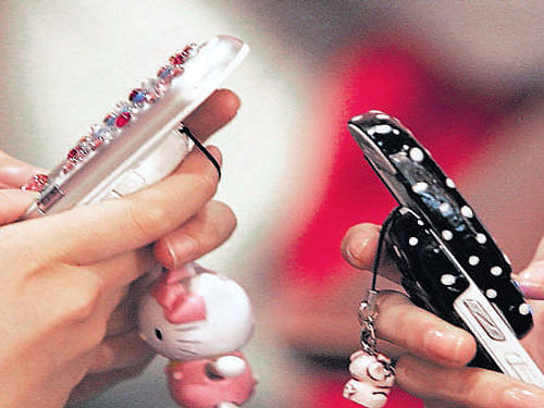 Members of Thakor community from a dozen villages in Banaskantha district in north Gujarat are reported to have passed a resolution prohibiting the unmarried girls in the community from using mobile phones. DH file photo