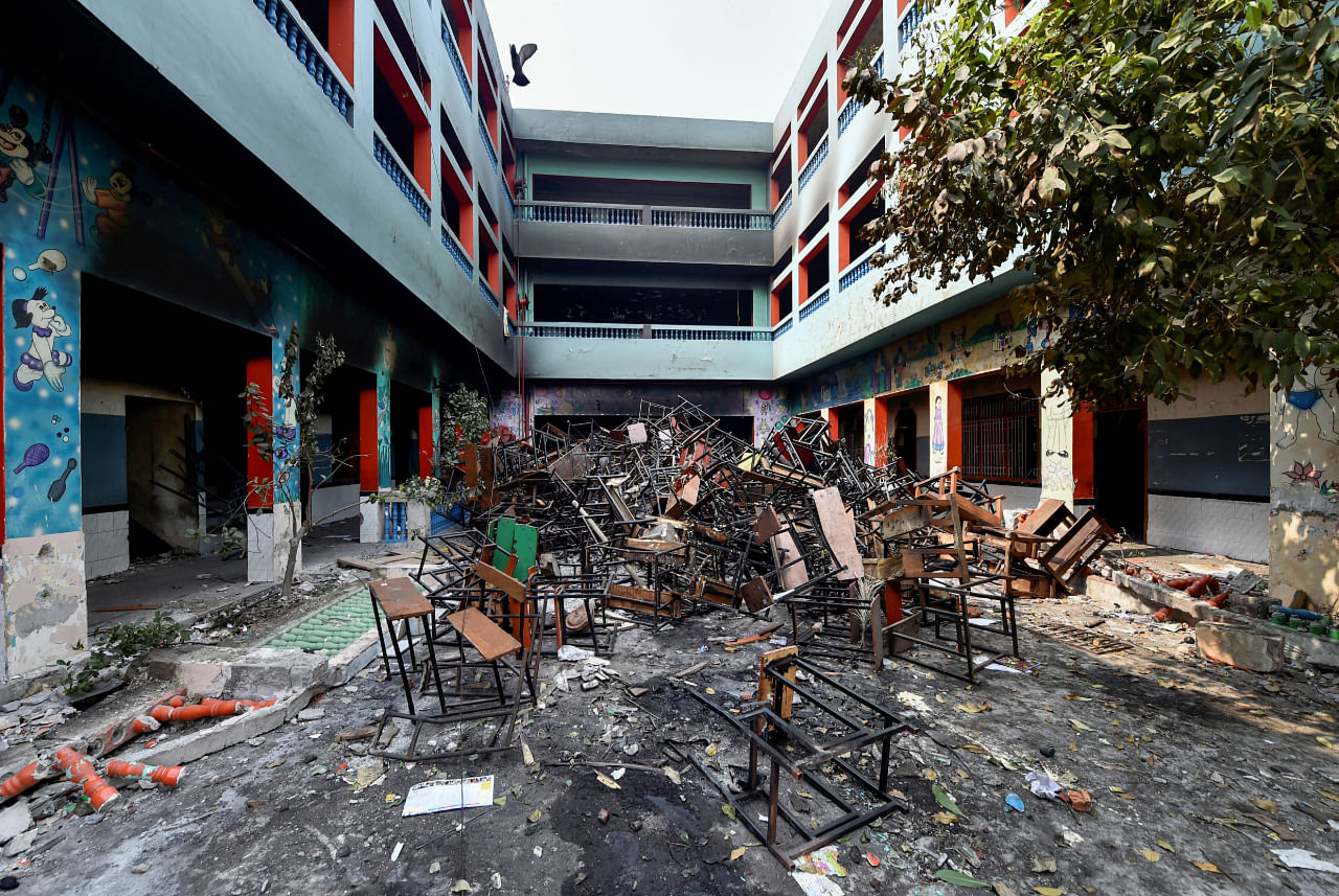 A vandalised private school in Shiv Vihar area of the riot-affected north east Delhi, Wednesday, Feb. 26, 2020. At least 22 people have lost their lives in the communal violence over the amended citizenship law as police struggled to check the rioters who ran amok on streets, burning and looting shops, pelting stones and thrashing people. (PTI Photo)