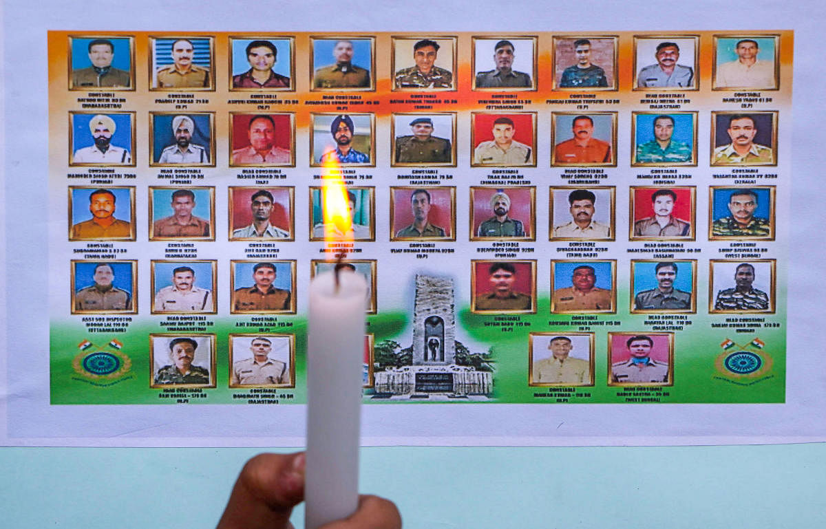 Students pay tribute to the martyred CPPF jawans, who lost their lives in a suicide bomber attack in Pulwama last year, in Jammu, Friday, Feb. 14, 2020. Credit: PTI Photo