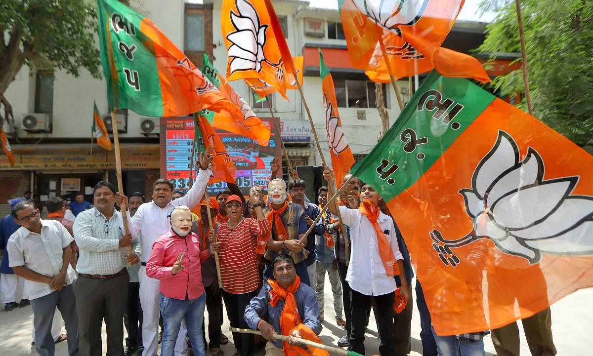 Ahmedabad: BJP supporters celebrate their party's lead in the Lok Sabha elections, at BJP office, in Ahmedabad, Thursday, May 23, 2019. (PTI Photo) (PTI5_23_2019_000080A)