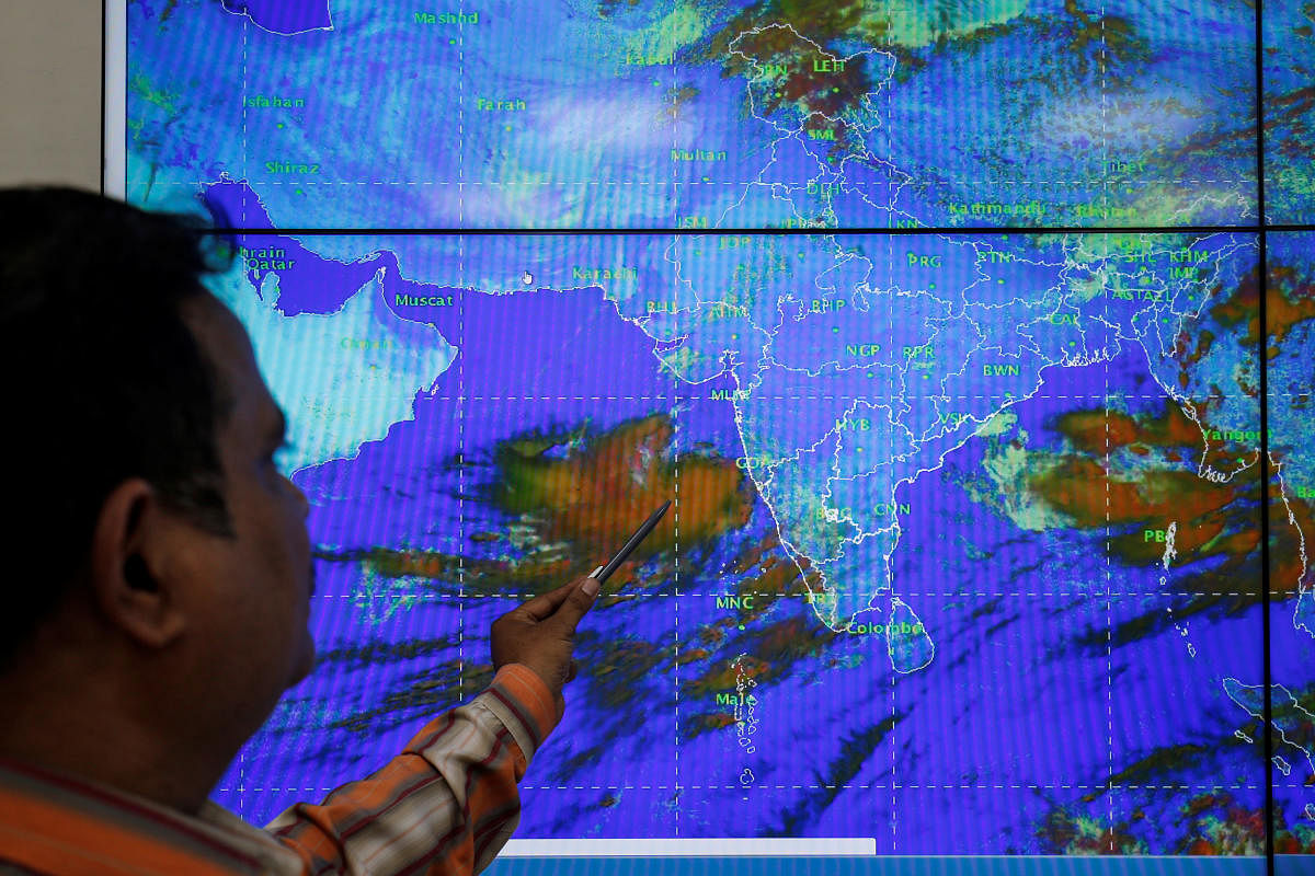 An India Meteorological Department scientist monitors Cyclone Vayu inside his office in Ahmedabad, India, June 11, 2019. REUTERS/Amit Dave