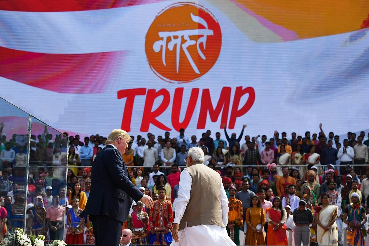 US President Donald Trump (L) and India's Prime Minister Narendra Modi leave after attending 'Namaste Trump' rally at Sardar Patel Stadium in Motera, on the outskirts of Ahmedabad, on February 24, 2020. (Photo by AFP)