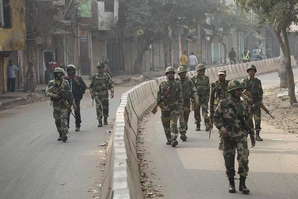  Security personnel patrol streets following clashes over the new citizenship law, in Yamuna Vihar area of northeast Delhi, Thursday, Feb. 27, 2020. (PTI Photo)
