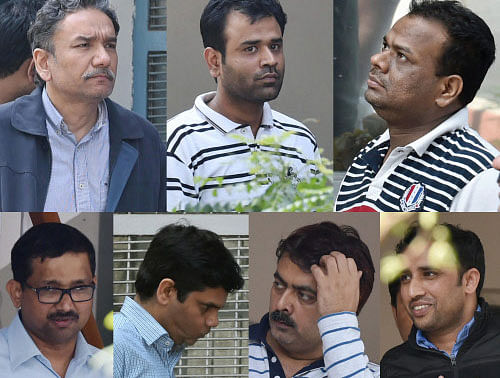 Journalist Santanu Saikia (first from left) and five senior executives from top energy firms , arrested in connection with corporate espionage scandal, before they were produced in a court in New Delhi on Saturday. PTI Photo