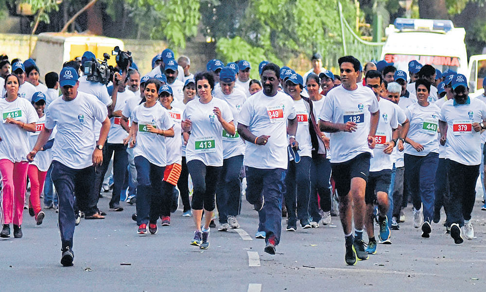 Participants at the 'Income Tax Run' in Cubbon Park on Sunday. DH Photo