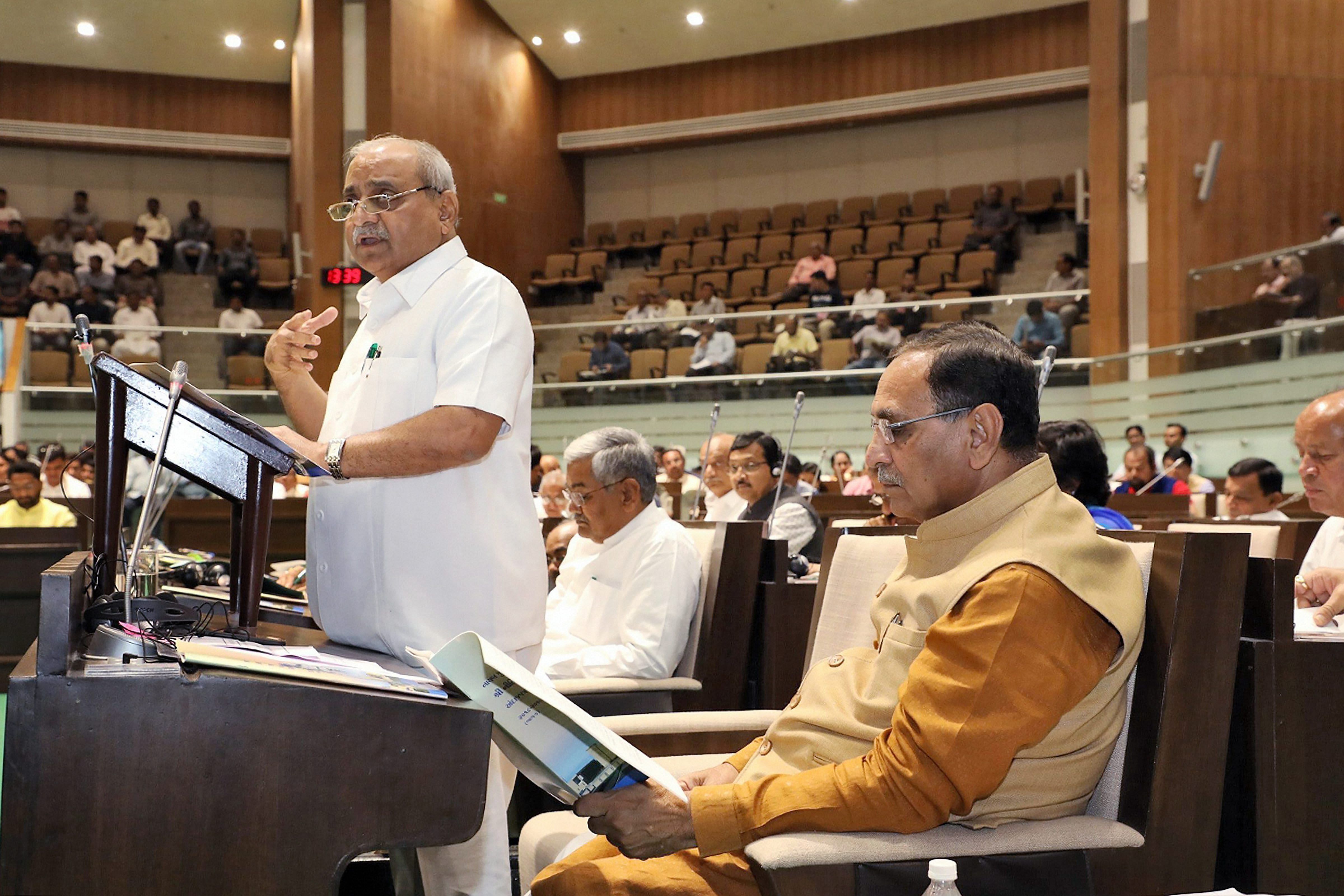 Gujarat Deputy Chief Minister and Finance Minister Nitin Patel presents the State Budget 2018-19 in the Assembly in Gandhinagar on Tuesday. (PTI Photo)