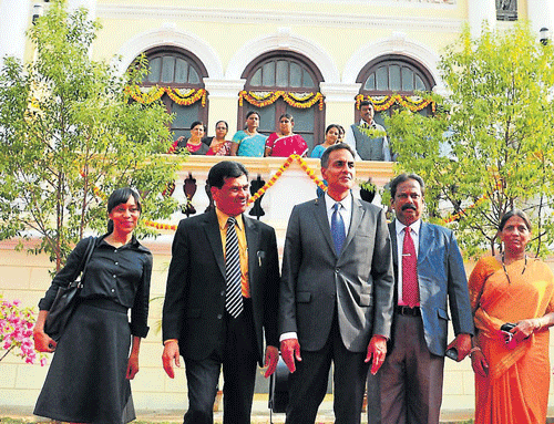 VC K S Rangappa, US Ambassador Richard Verma, Registrar C Basavaraju and director of ORI H P Devaki seen in front of the restored ORI building, in Mysuru, on Tuesday. DH PHOTO