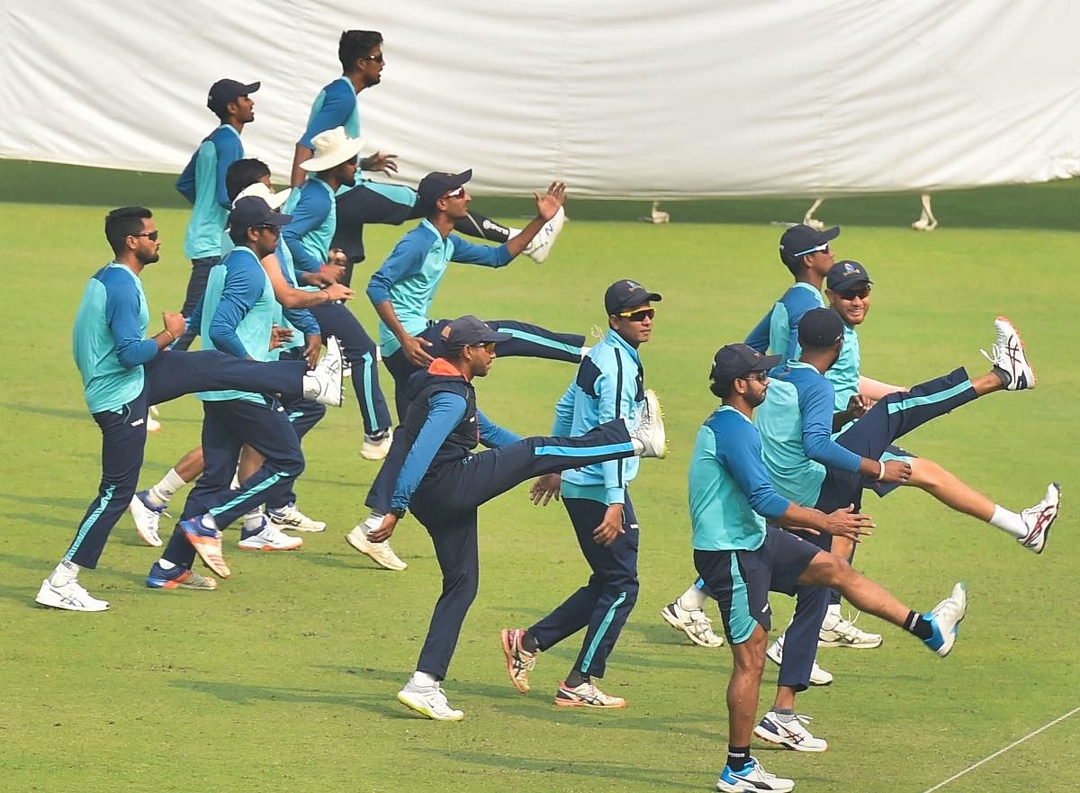 Bengal cricket players warm-up during a training session on the eve of Ranji Trophy semi-final match between Bengal and Karnataka, at Eden Gardens, in Kolkata, Friday, Feb. 28, 2020. (PTI Photo)