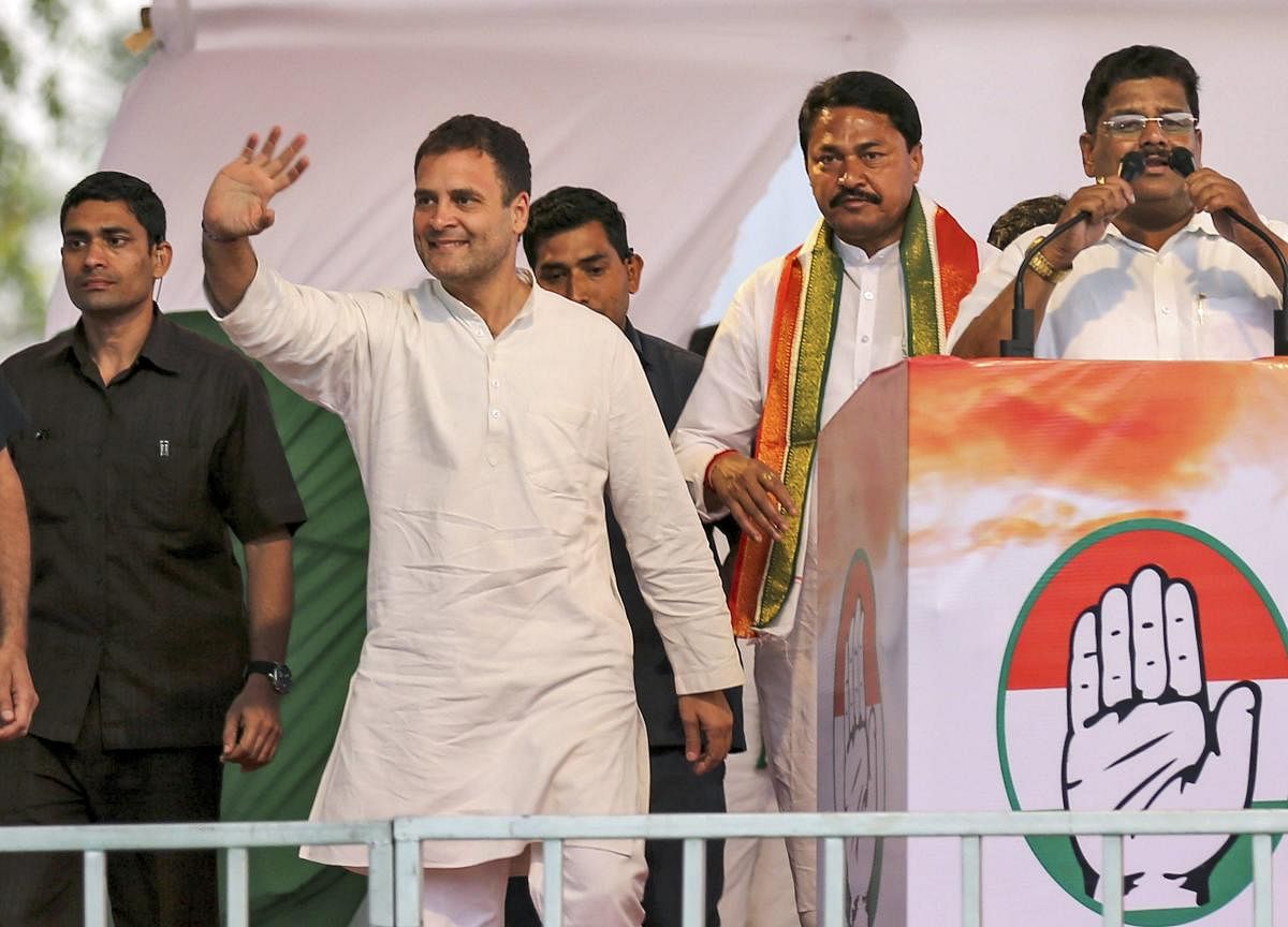 Congress President Rahul Gandhi waves to his supporters during an election campaign for the upcoming Lok Sabha polls, in Nagpur, Thursday, April 04, 2019 (PTI Photo)