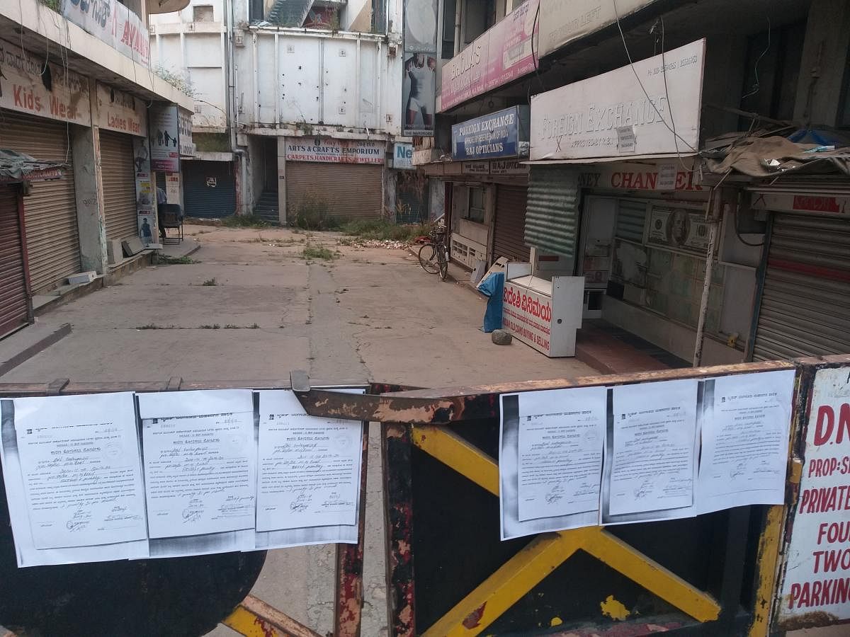 BBMP officials pasted notices on the gates of Shrungar Complex on Thursday. SPECIAL ARRANGEMENT