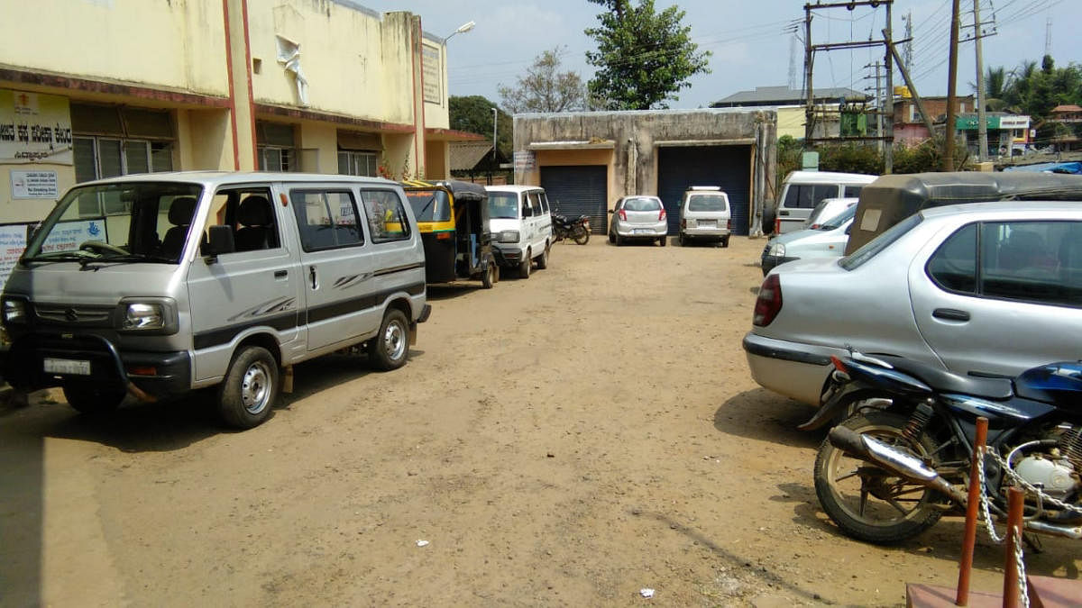 Vehicles parked on the premises of Siddapura community health centre.