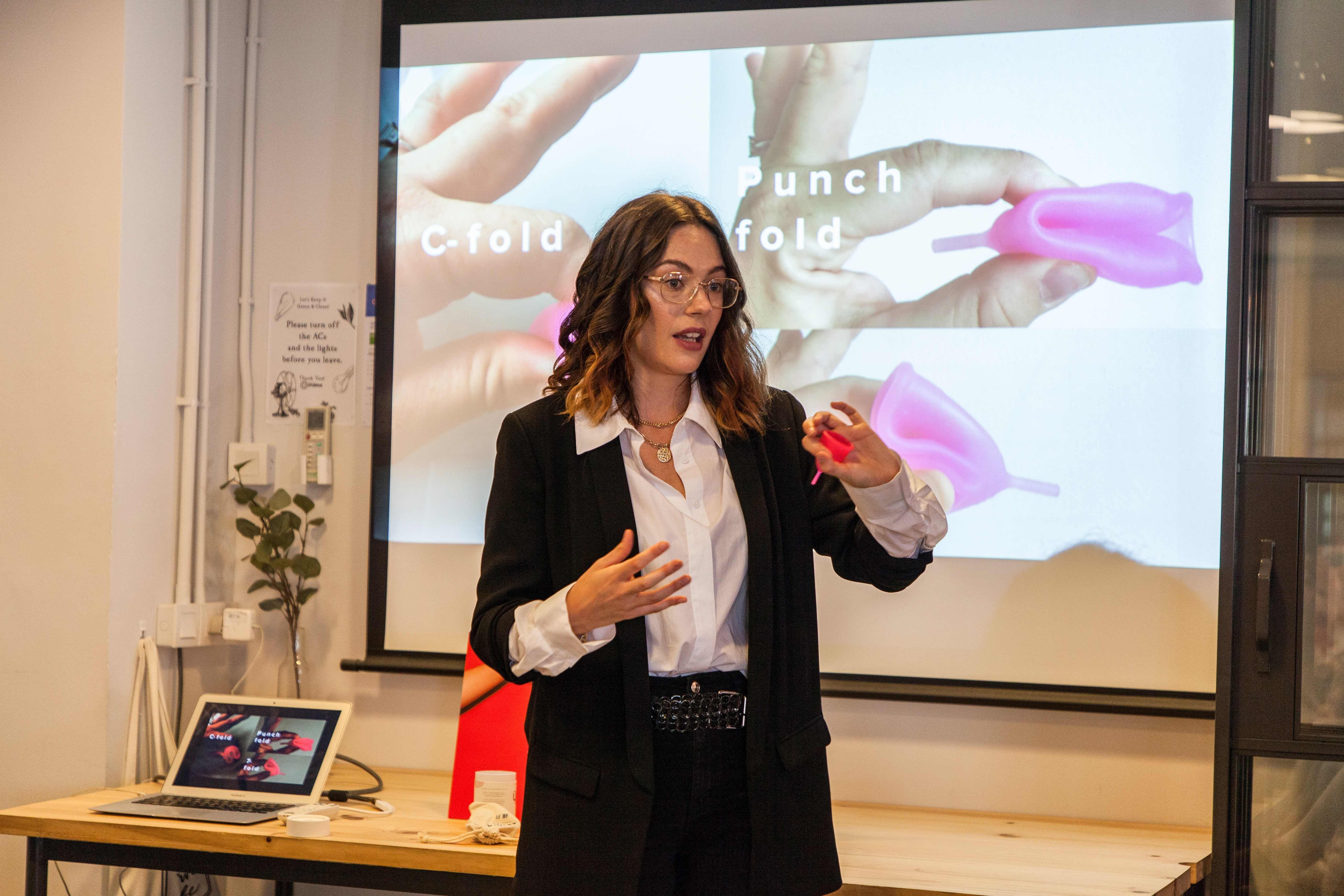 This picture taken on February 27, 2020 shows Olivia Cotes-James, founder of LUUNA Naturals, speaking during a workshop in Hong Kong. (Credit: AFP Photo)