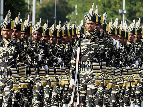 Border Security Force participate in a full dress rehearsal, ahead of Independence Day celebrations, in Chennai on Saturday. PTI photo.