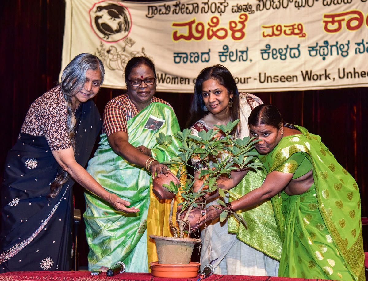 Jaya Mehta, Economist, C Motamma, Politician, M D Pallavi, Singer and artist and Mokshamma are watering the plant to the mark of inaugurating Convention unseen work, unheard stories Convention on Women and Labour organised by Gram Seva Sangh and Centre for Budget and Policy Studies at Kondajji Basappa Auditorium, in Bengaluru on Saturday. Photo by S K Dinesh