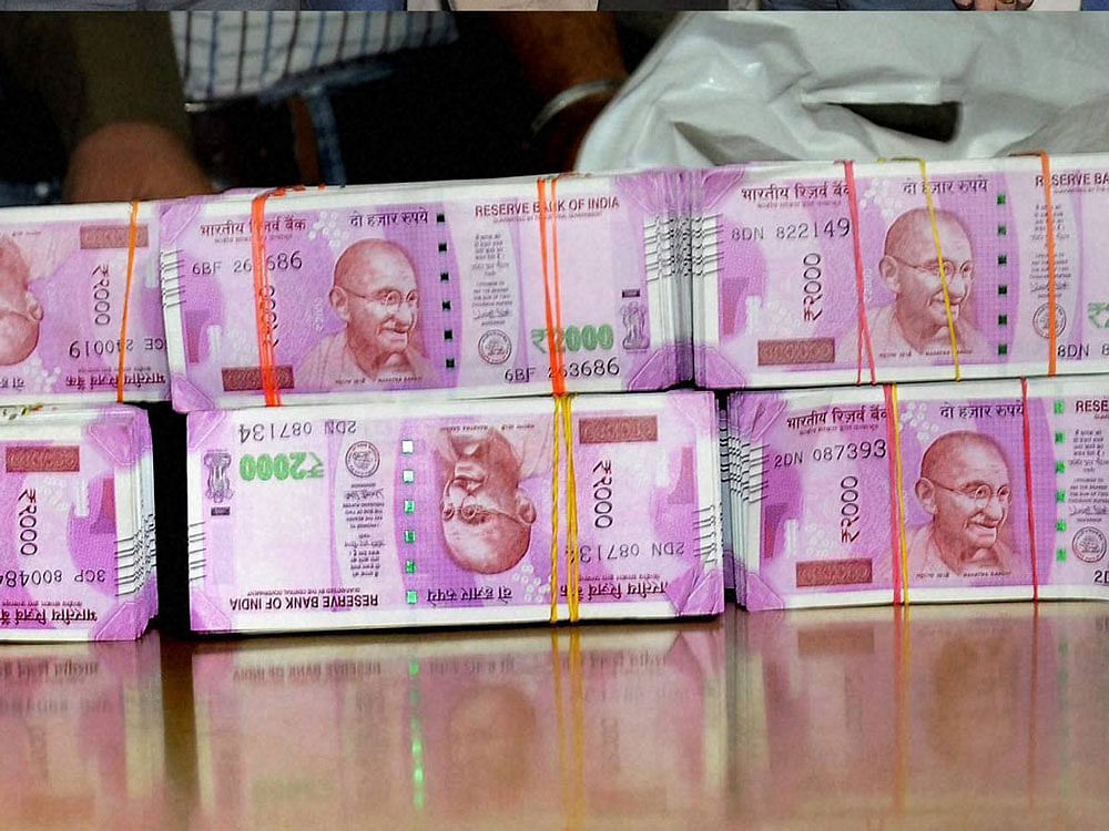 As per the data placed before the Upper House, Border Security Force has seized 378 new Rs 2,000 currency notes from Assam and West Bengal post demonetisation. dh file photo