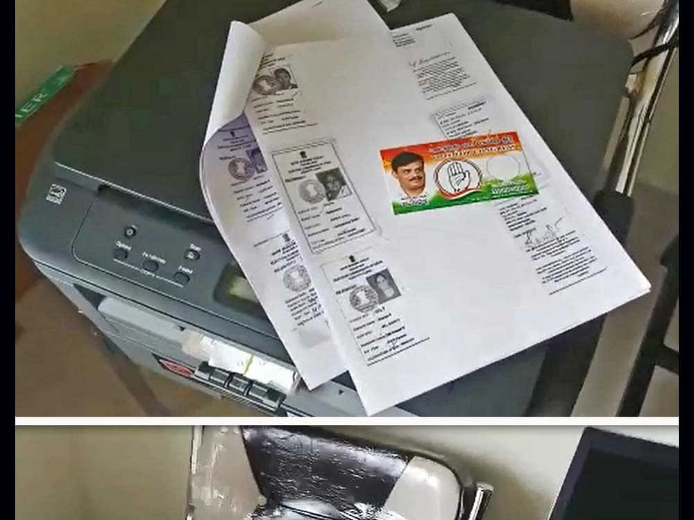 About 50,000 fake voter ID cards and seven laptops were found in an apartment at Jalahalli ward in Rajarajeshwari Nagar constituency on Tuesday. It is believed that Congress candidate Munirathna was behind distributing this to voters
