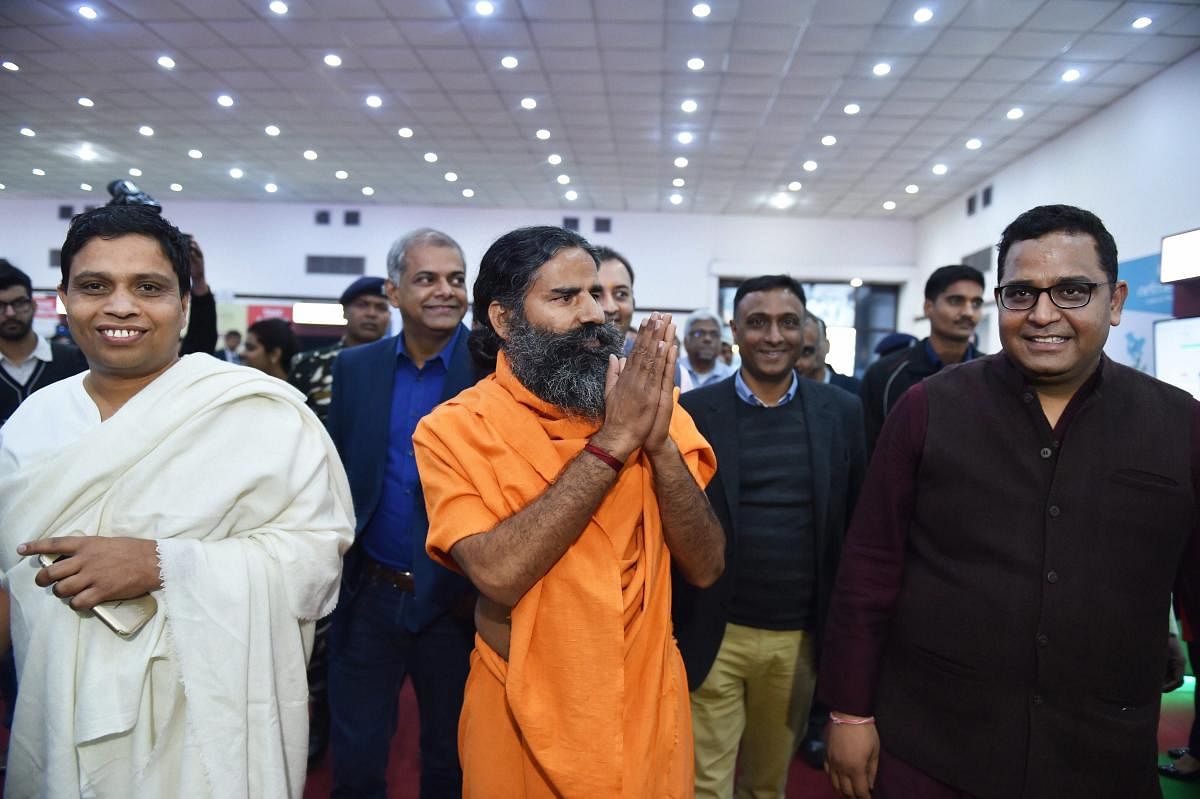 Yoga guru Baba Ramdev and Patanjali MD Acharya Balkrishna in New Delhi. PTI file Photo