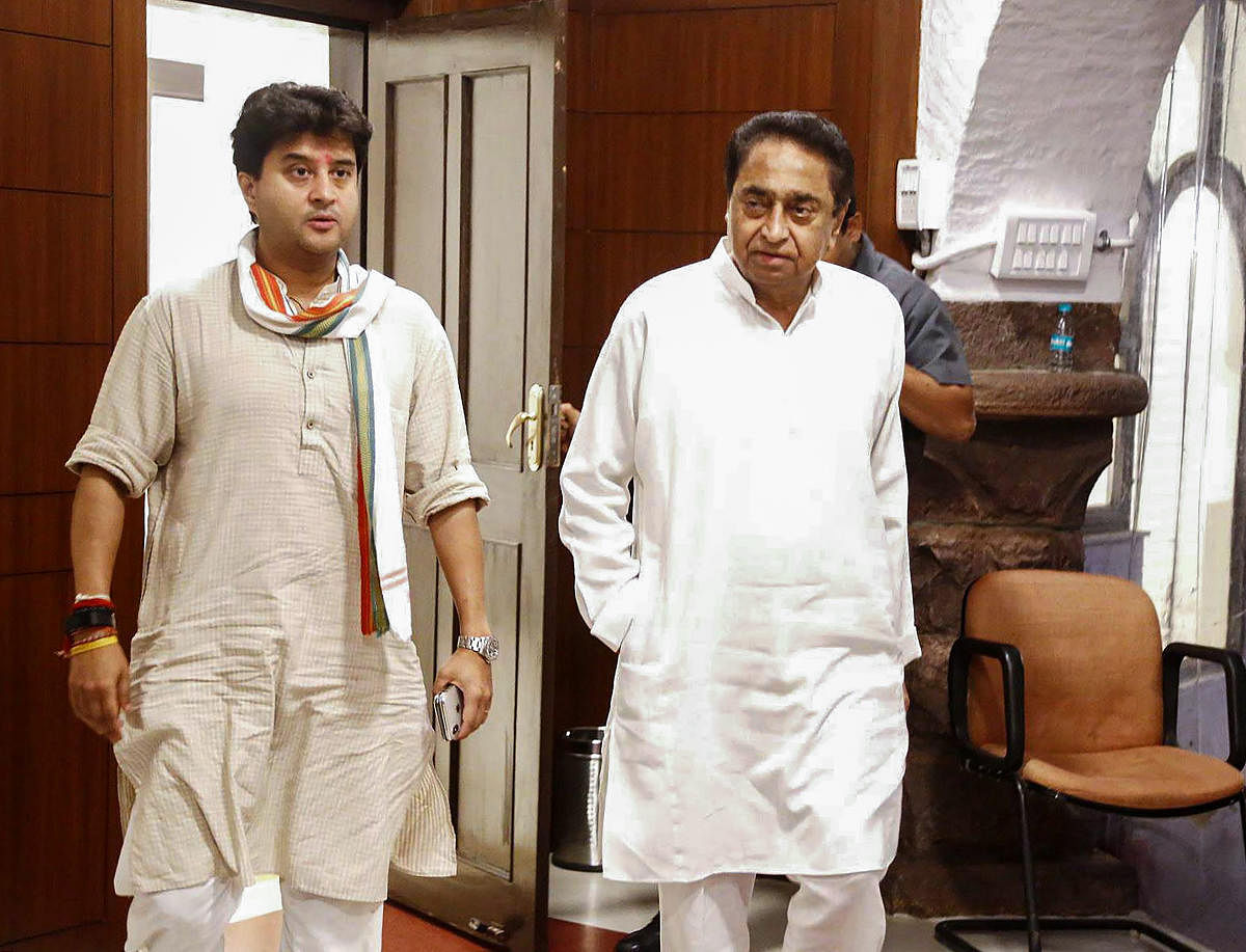 Madhya Pradesh Chief Minister Kamal Nath with Congress General Secretary Jyotiraditya Scindia during a call on, in Bhopal, Tuesday, Sept. 17, 2019. (PTI Photo)