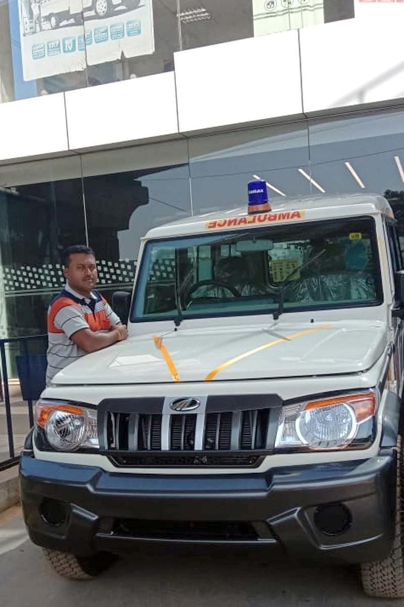 Padmakumar Nayarkere with the ambulance.