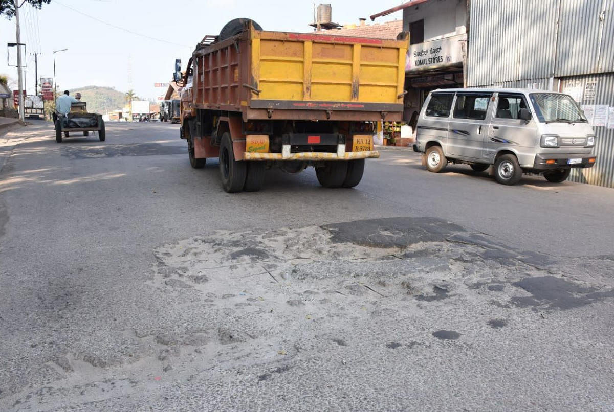 The pothole-ridden road near Madikeri Fort.