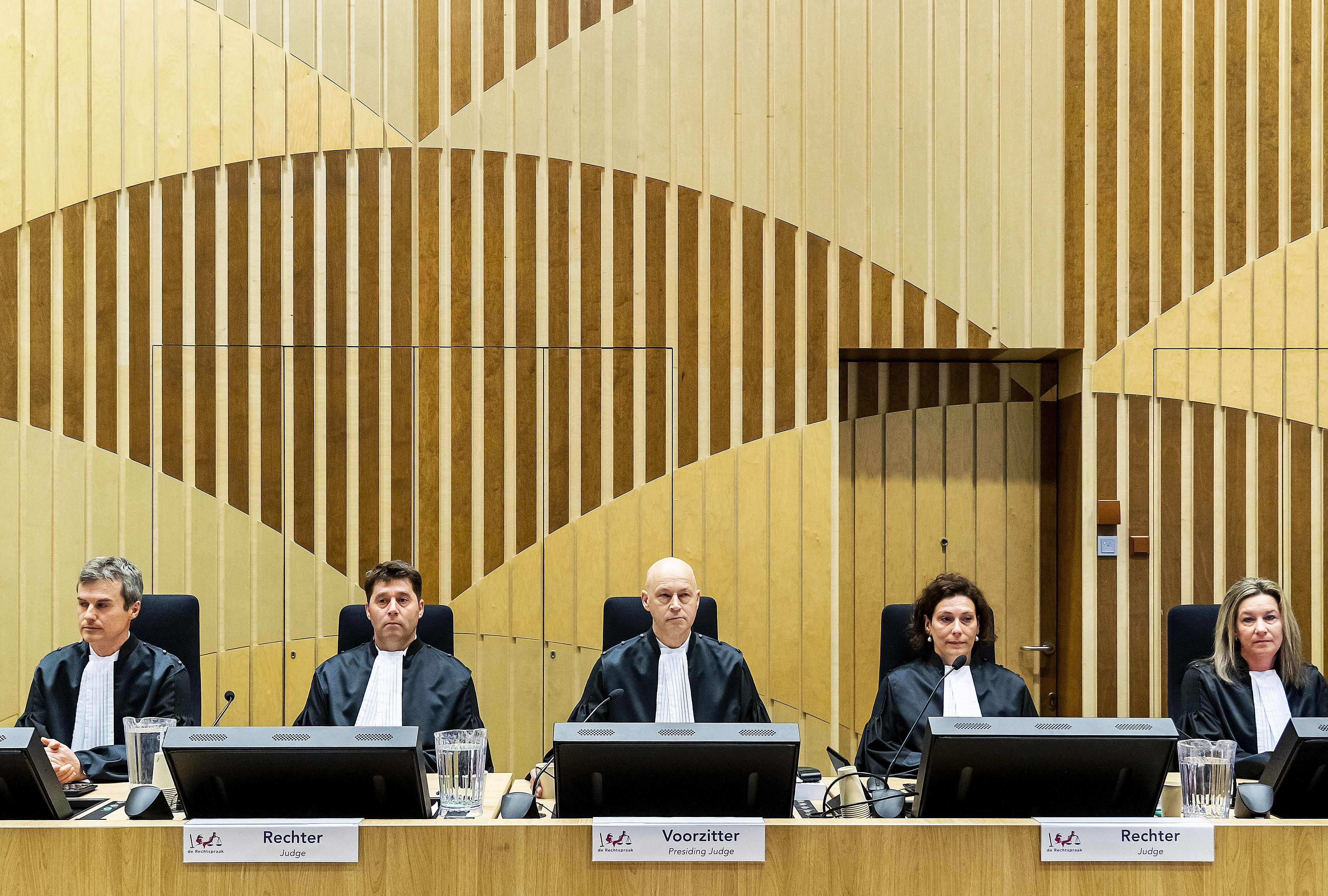 Magistrates wait, on March 9, 2020 in Schiphol, before the opening of the trial of four men accused of murder over the downing of Malaysia Airlines flight MH17 in 2014, even though the suspects are still at large. (AFP Photo)