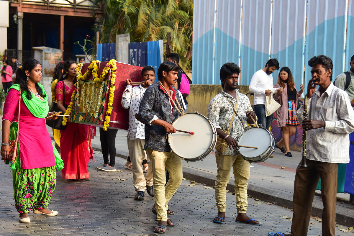 Members of CRY raise awareness against child marriage on Church Street in Bengaluru on Sunday. DH Photo/S K Dinesh