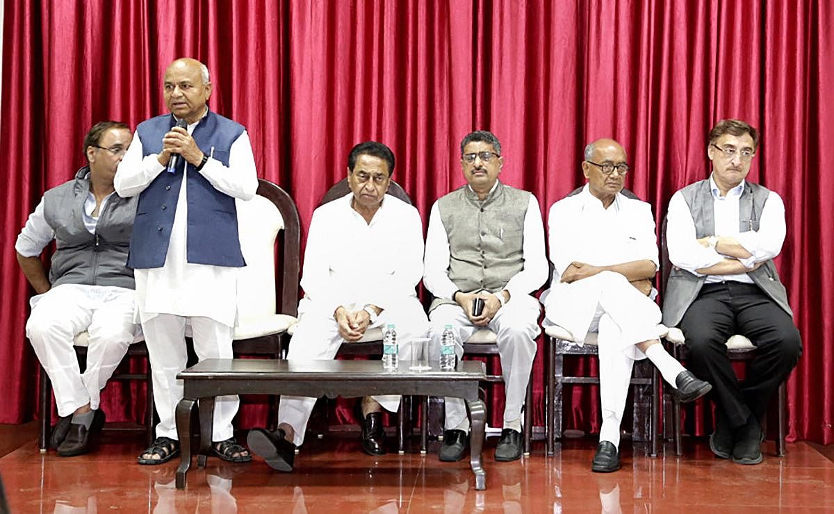 Madhya Pradesh Minister for Parliamentary Affairs Govind Singh addresses Congress legislature party meeting at Chief Minister Kamal Nath's residence in Bhopal on Tuesday. Kamal Nath and senior Congress leader Digvijaya Singh were also present. PTI