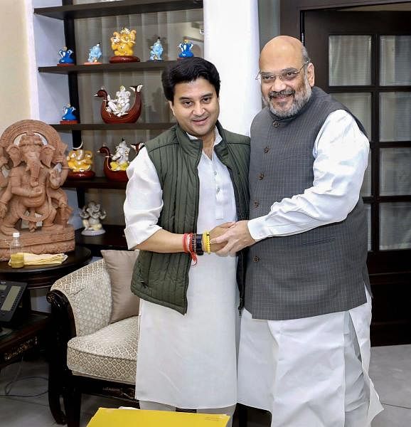Jyotiraditya Scindia meets Home Minister Amit Shah in New Delhi, Thursday, March 12, 2020, a day after joining the BJP. (PTI Photo) 