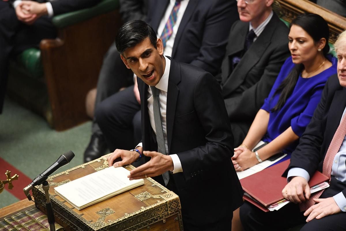 UK Parliament shows Britain's Chancellor of the Exchequer Rishi Sunak delivering his 2020 Spring budget statement in the House of Commons in London. (AFP Photo)