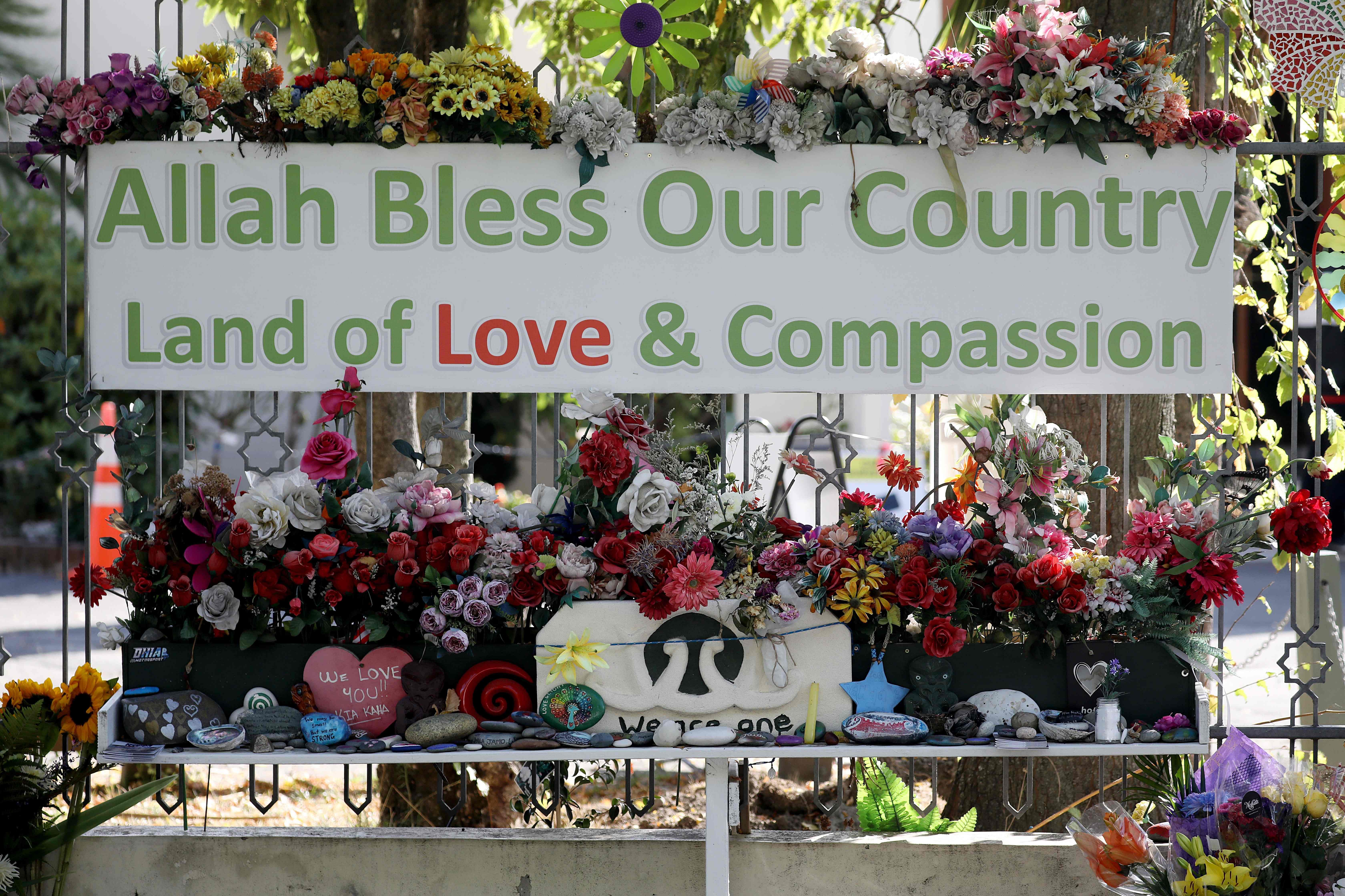 Flowers and messages are seen outside the Al Noor mosque, two days ahead of the first anniversary of the Christchurch mosque shootings, in Christchurch on March 13, 2020. (Credit: AFP)