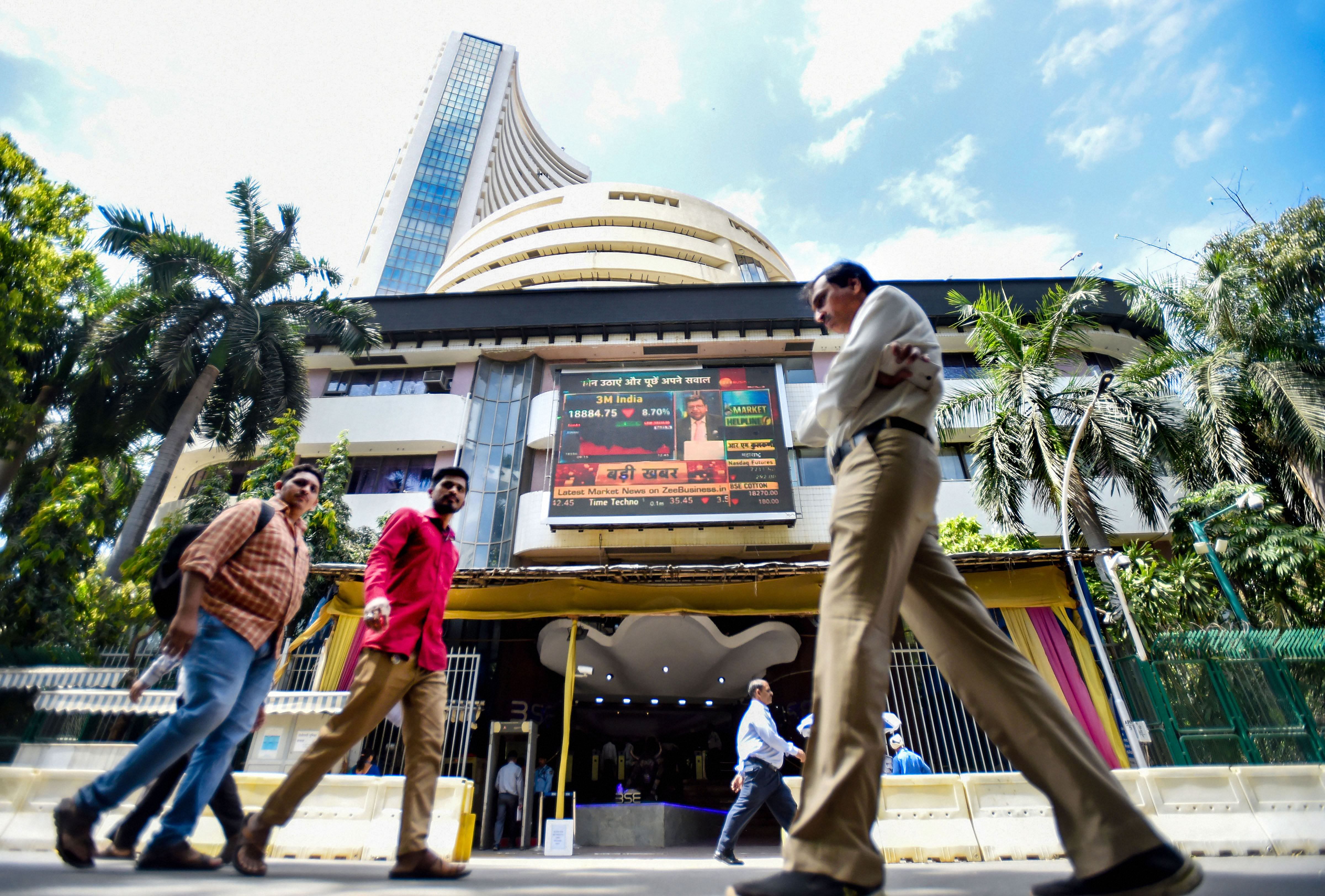 In the afternoon session, the Sensex was trading higher by over 1,400 points or 4.28 per cent at 34,178, while the NSE Nifty was up 467 points or 4.89 per cent at 10,057. (Credit: PTI Photo)