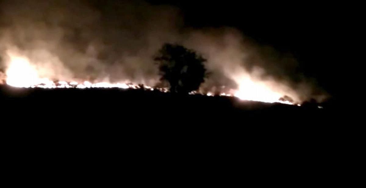 Fire in forest under Cauvery Wildlife Sanctuary limits, in Malavalli taluk, Mandya district, on Thursday night.