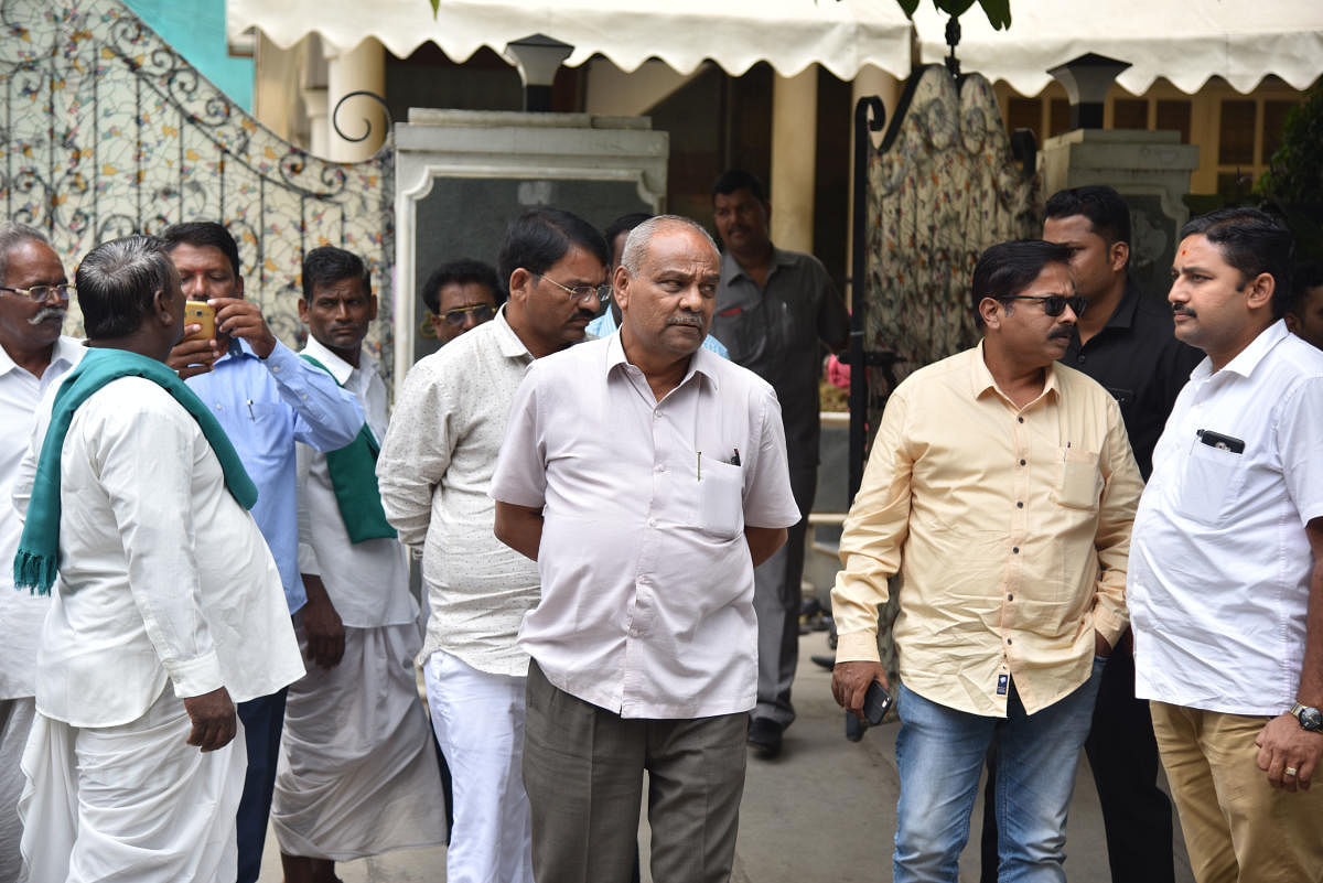 Former Minister Umesh Katti and supporters coming out BJP State President BS Yeddyurappa’s house at Davalagiri, RMV 2nd stage in Bengaluru on Thursday, 25 July, 2019. Photo by Janardhan B K | DH Photo