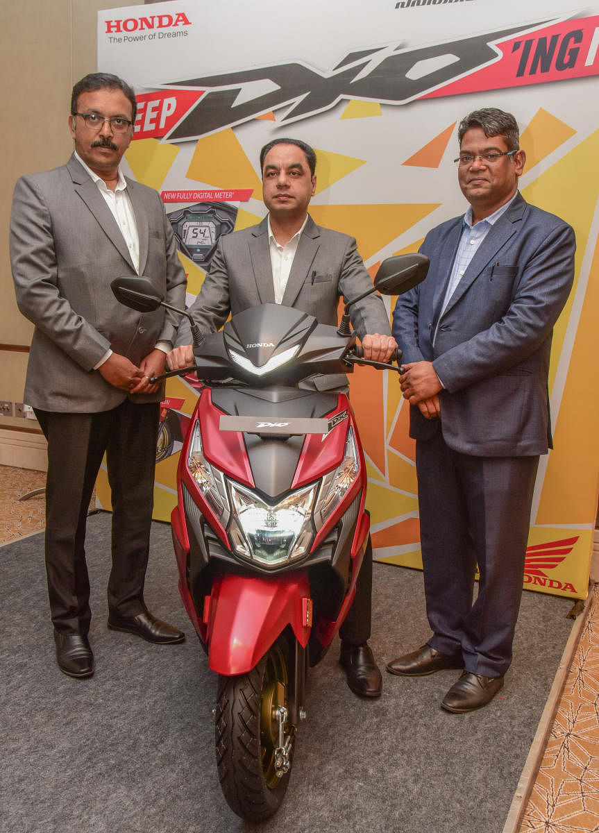 Prabhu Nagraj, Vice President, Brand and Communication, Yadvinder Singh, Senior Vice President, Sales and Marketing and Yogesh Mathur, Regional Manager south of Honda Motors and Scooter India are seen at the Honda Dio BS VI Scooter South India launch programme by Honda Motors and Scooter India in Bengaluru (DH Photo /S K Dinesh)