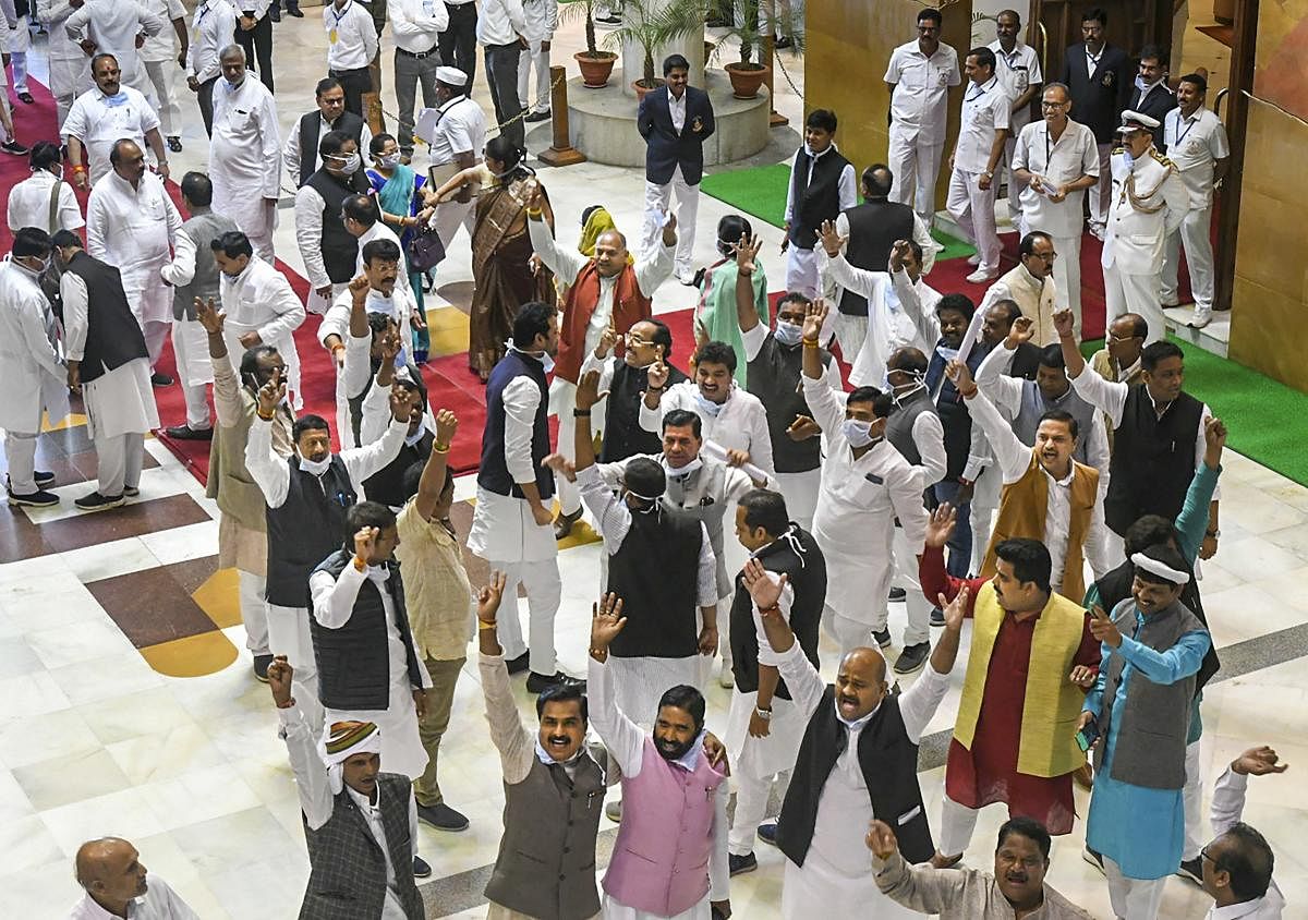  Congress MLAs shout slogans during the budget session of state assembly, in Bhopal, Monday, March 16, 2020. (PTI Photo)