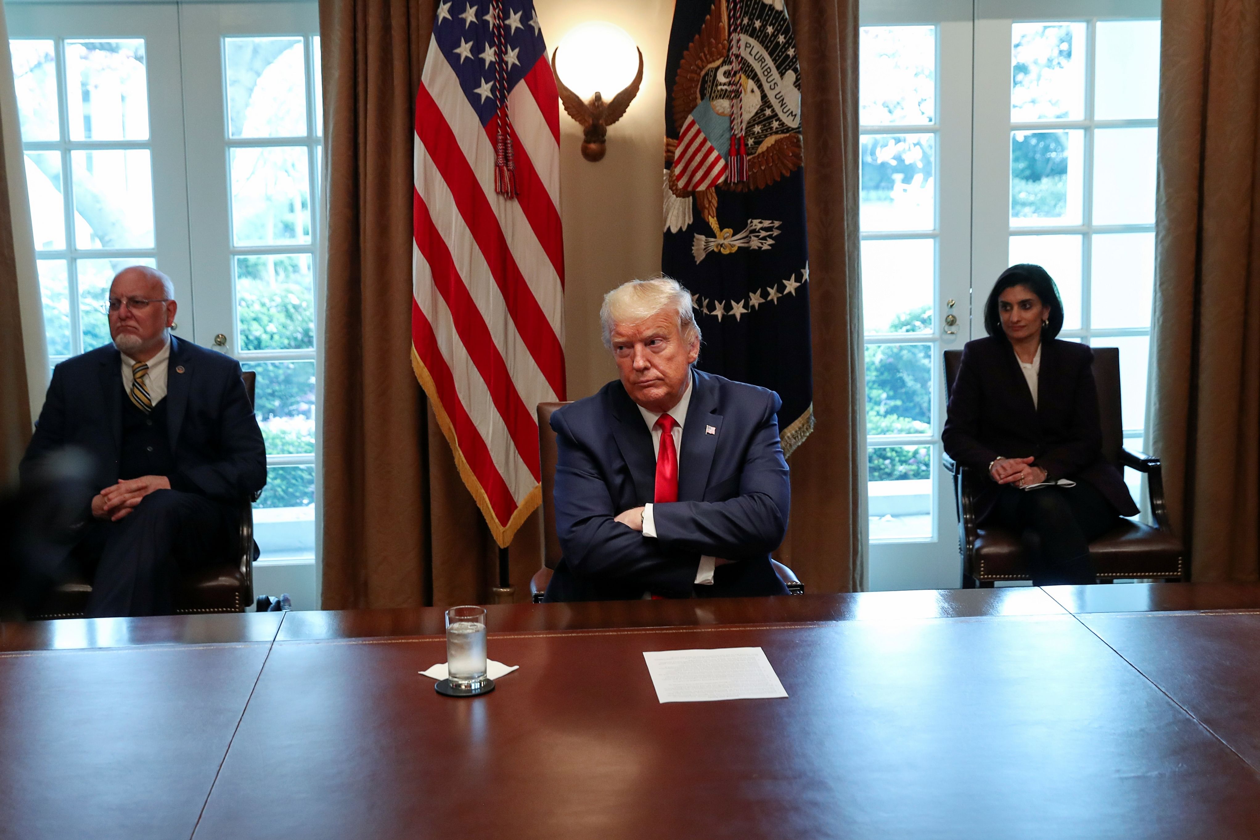 U.S. President Donald Trump meets with representatives of nurses organizations on coronavirus response in the Cabinet Room of the White House in Washington. (Credit: Reuters)