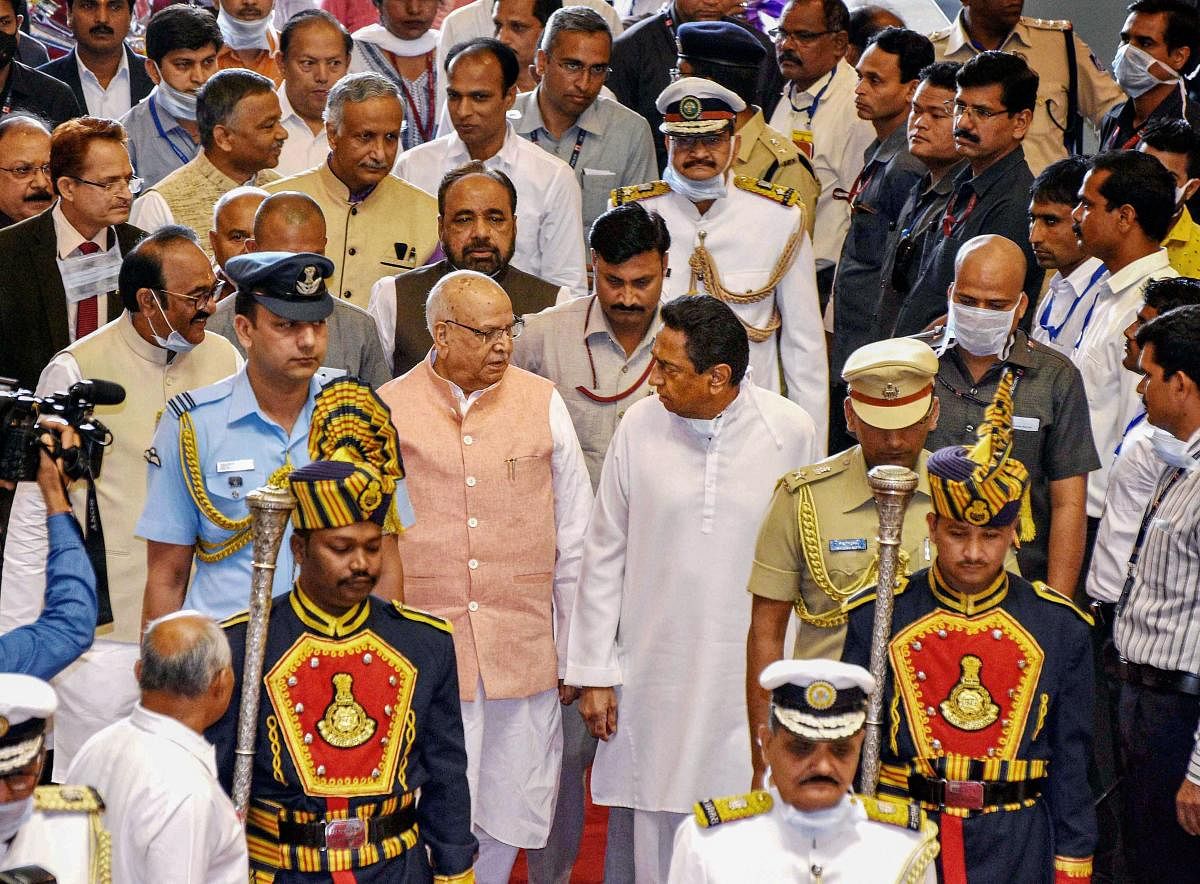 Madhya Pradesh Governor Lalji Tandon along with Chief Minister Kamal Nath and others arrives during the budget session of state assembly, in Bhopal, Monday, March 16, 2020. (PTI Photo)