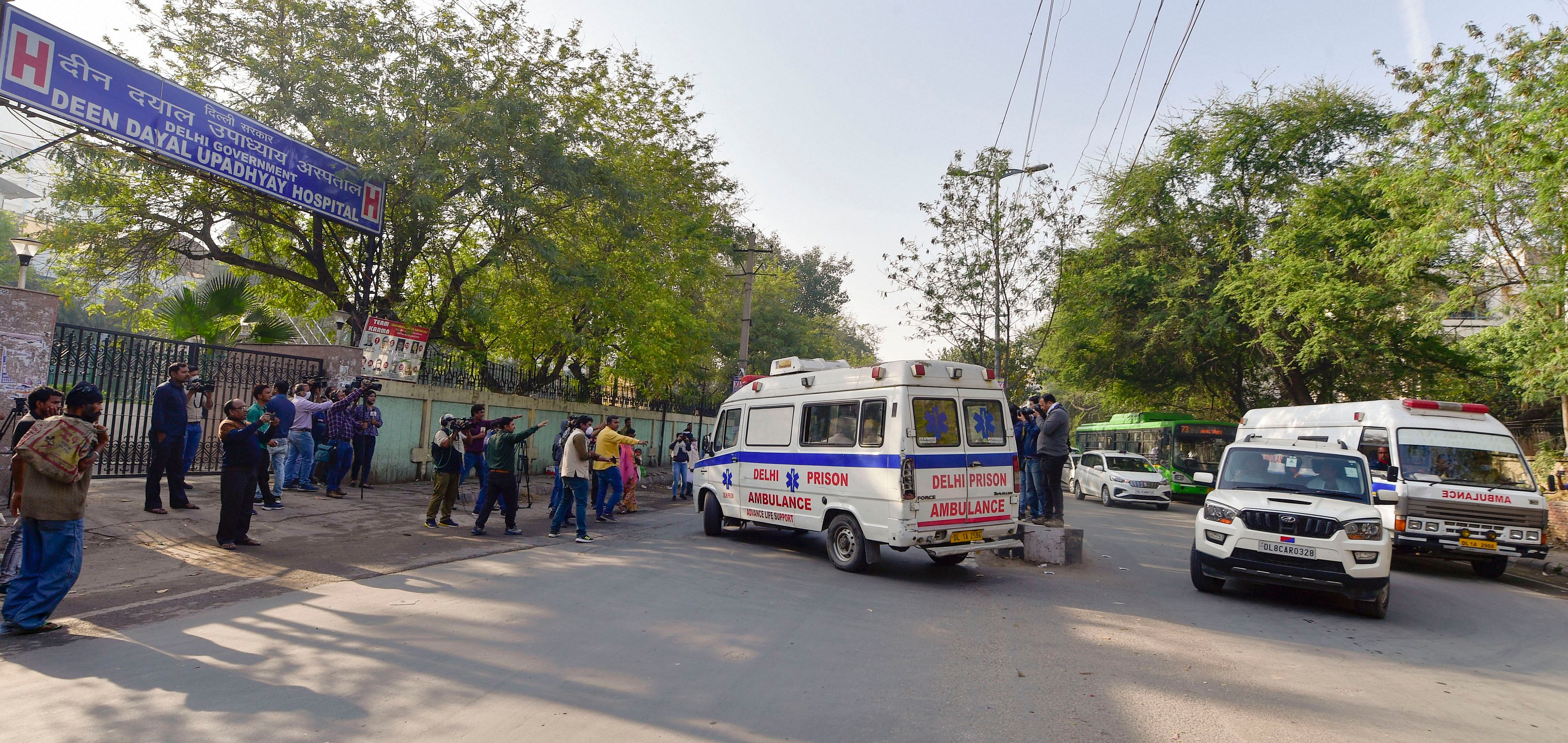 Ambulances carrying the bodies of four men executed at Tihar Jail, who were convicted in the Nirbhaya rape and murder case, as they are brought for postmortem at the DDU hospital in New Delhi, Friday, March 20, 2020. (Credit: PTI Photo)