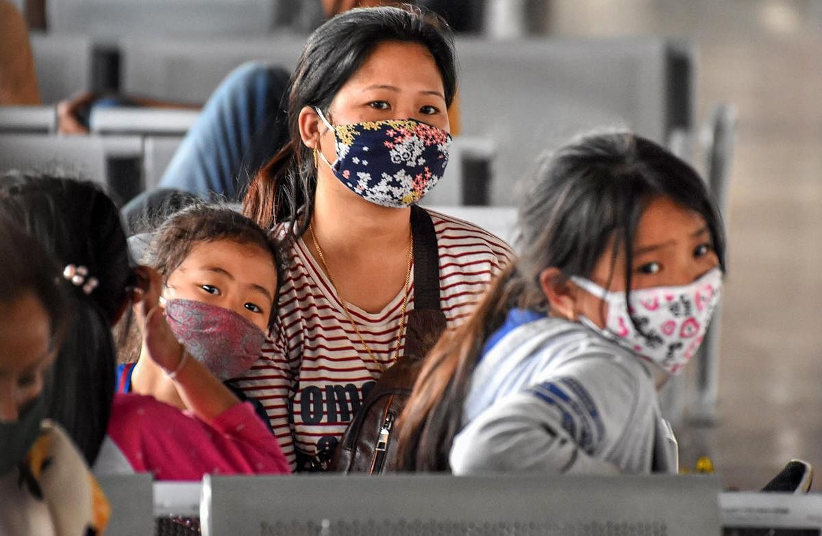 People wear masks as a preventive measure against coronavirus (PTI Photo)
