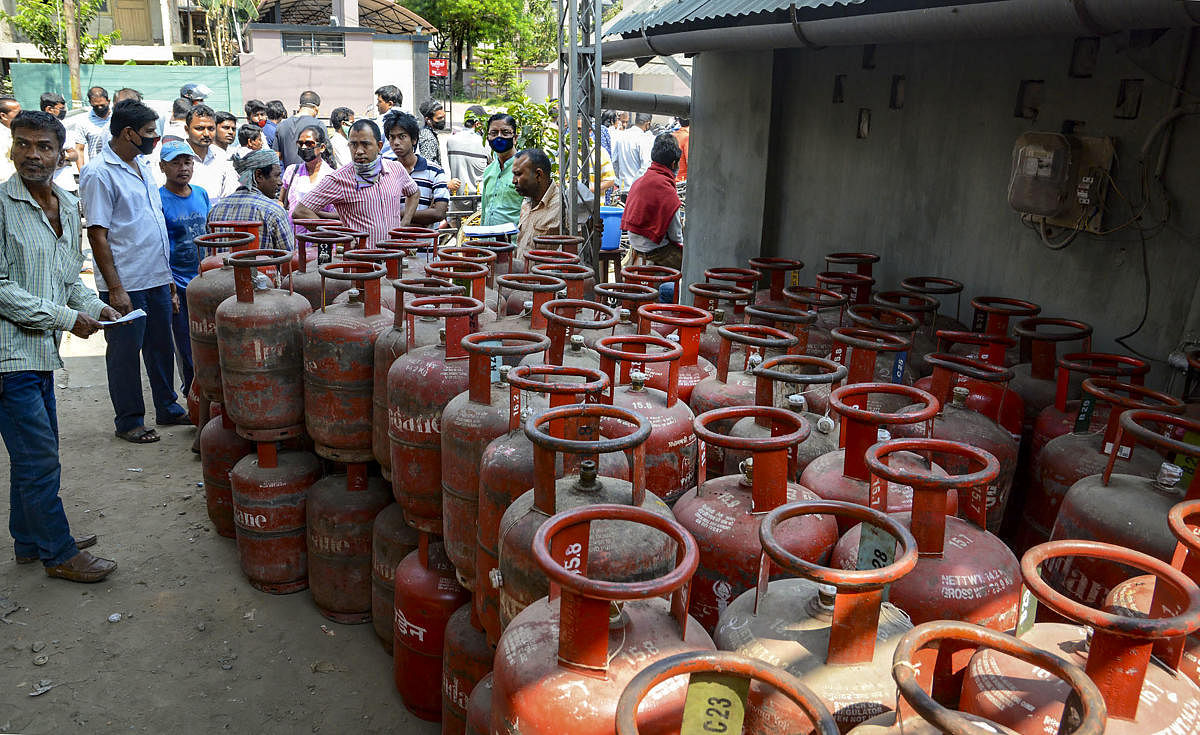 Locals gather to collect LPG cylinder after lockdown as a precautionary measure against coronavirus pandemic. (Representative image/PTI Photo)