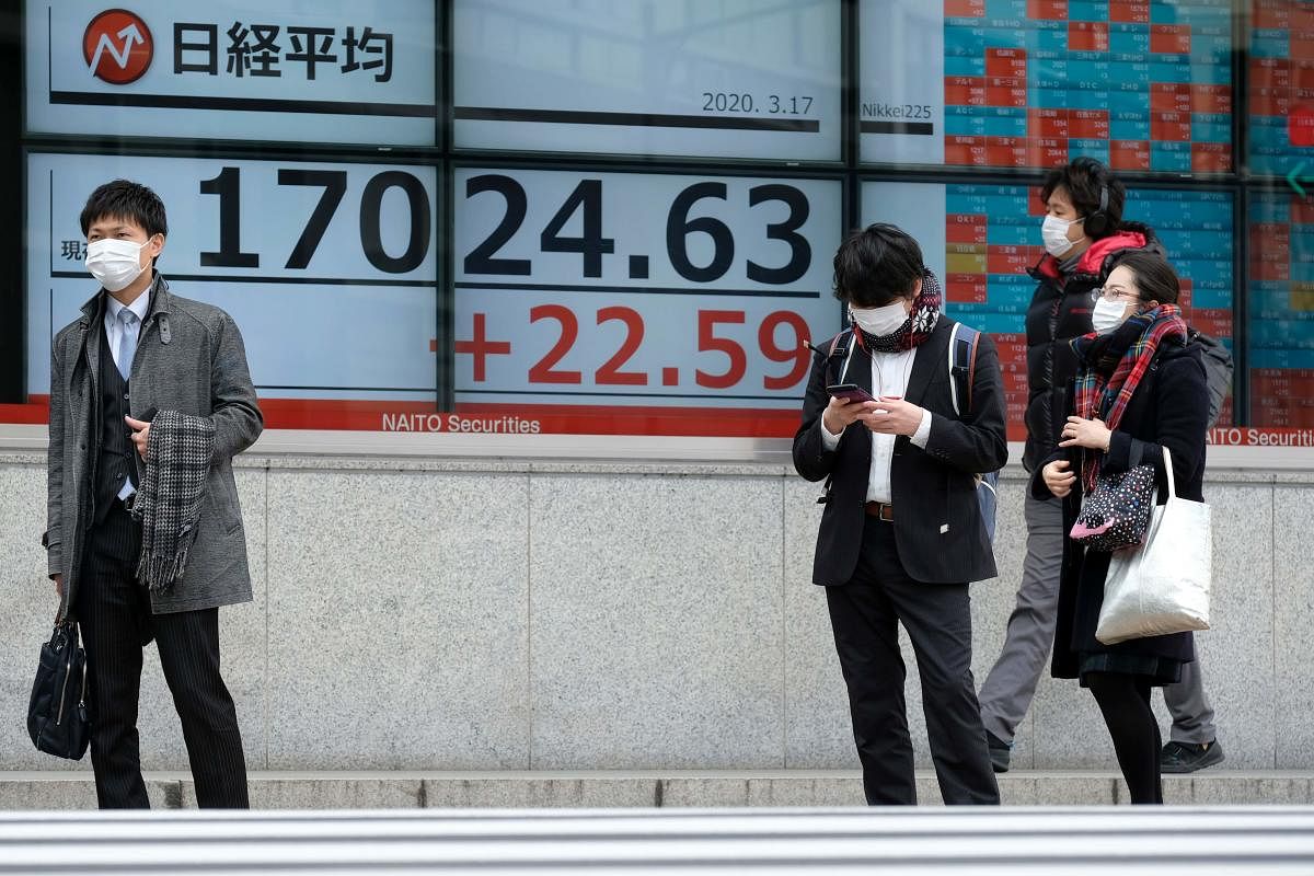 The Nikkei 225 index shot up 4.91 percent, or 828.77 points, to 17,716.55 in early trade. AFP file photo