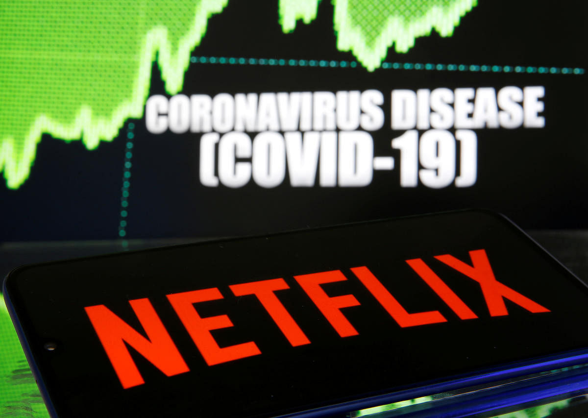 Netlix logo is seen in front of diplayed coronavirus disease (COVID-19) (Reuters Photo)