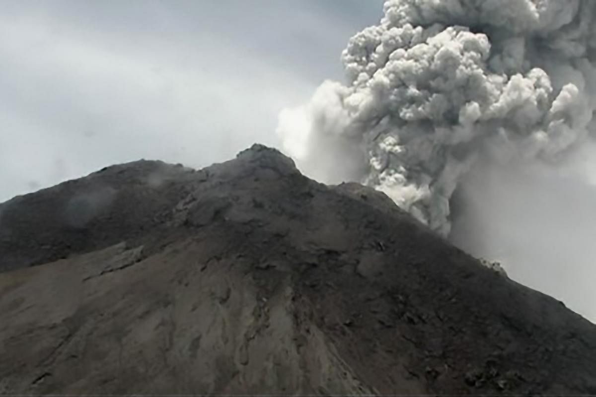 Mount Merapi volcano spews volcanic ash as seen from Yogyakarta. Photo by Handout / BNPB / AFP