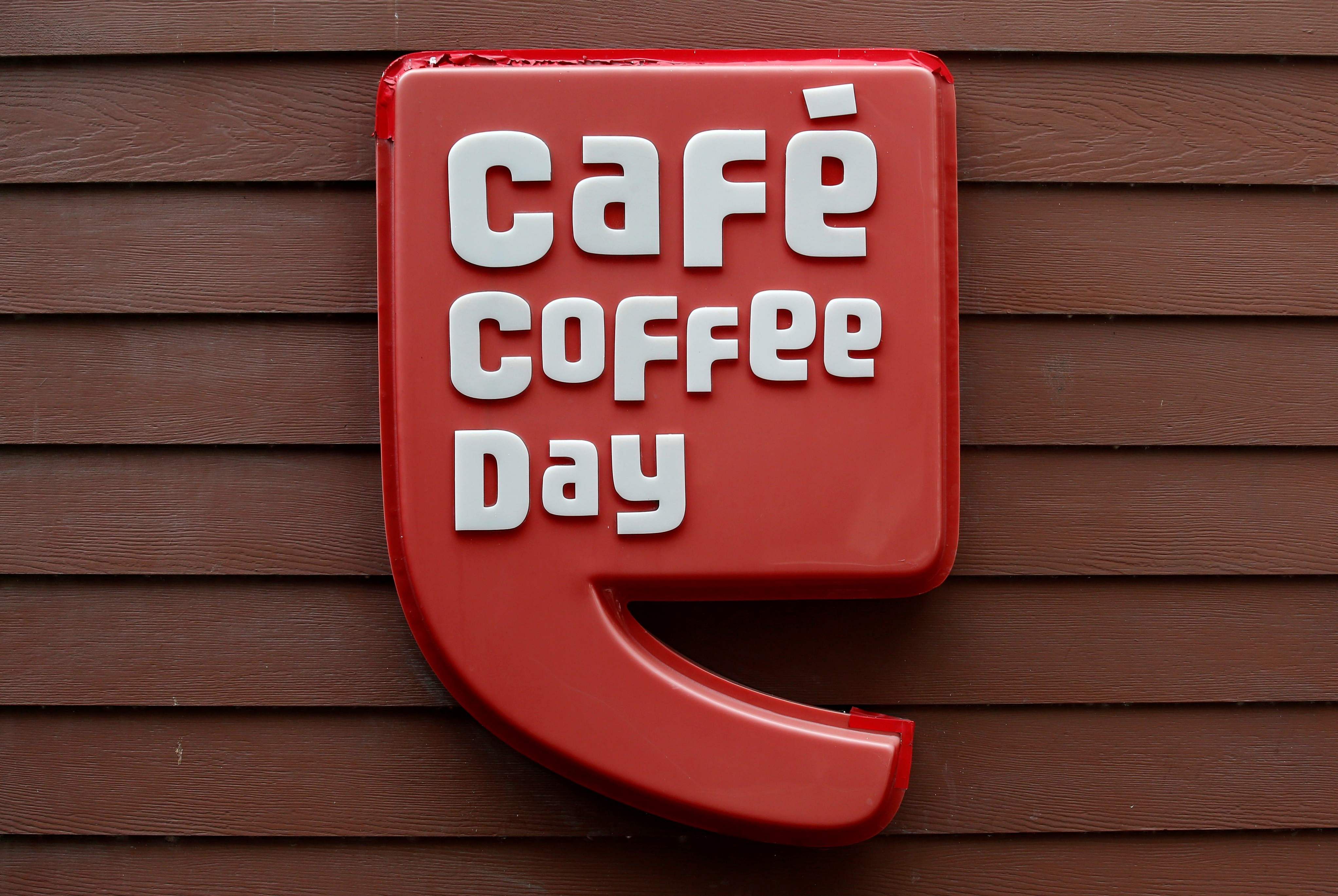 The logo of Cafe Coffee Day is pictured at one of its outlets. (Credit: Reuters)