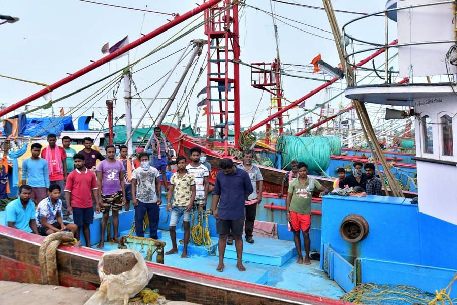 Labourers stranded in anchored fishing boats at Old Port in Mangaluru. Credit: Govindraj Javali/ DH Photo