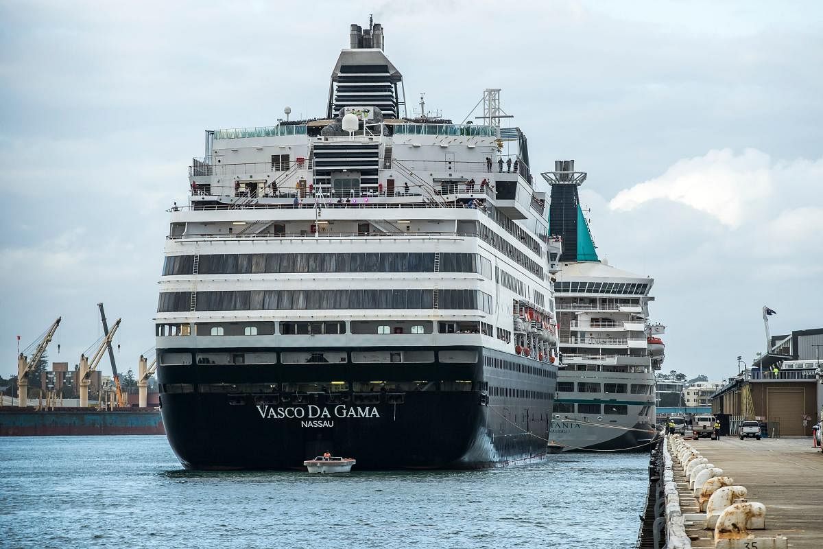 Cruise ship CMV Vasco berths behind MV Artania at the port of Fremantle for emergency refuelling and supplies (AFP Photo)