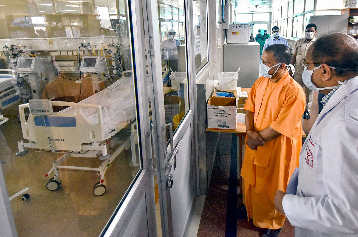 UP CM Yogi Adityanath reviews the facilities which will be granted to coronavirus-affected patients. PTI