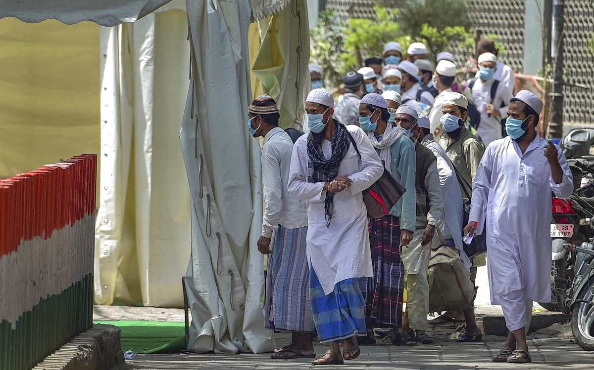 People who came for ‘Jamat’, a religious gathering at Nizamuddin Mosque, being taken to LNJP hospital for COVID-19 test, after several people showed symptoms of coronavirus, during a nationwide lockdown, in New Delhi, Tuesday, March 31, 2020. (PTI Photo)
